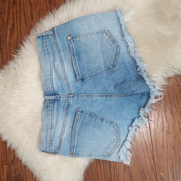 Celebrity Pink Cutoff Medium Wash Buttonfly Shorts - Picture 2 of 5